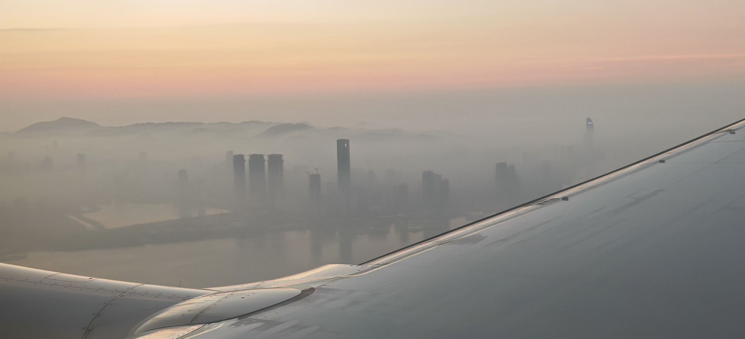 View from an airplane window at dusk